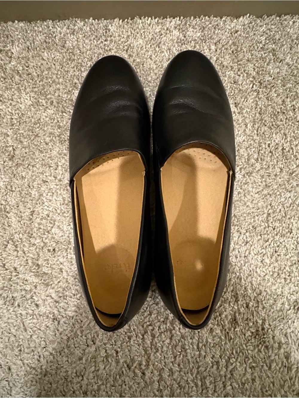 Dansko Black Leather Slip-On Flats with Tan Insole